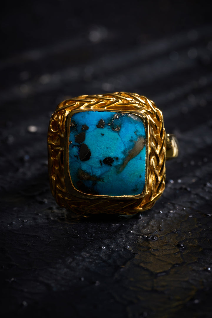 Silver ring gold plated with a turquoise stone 