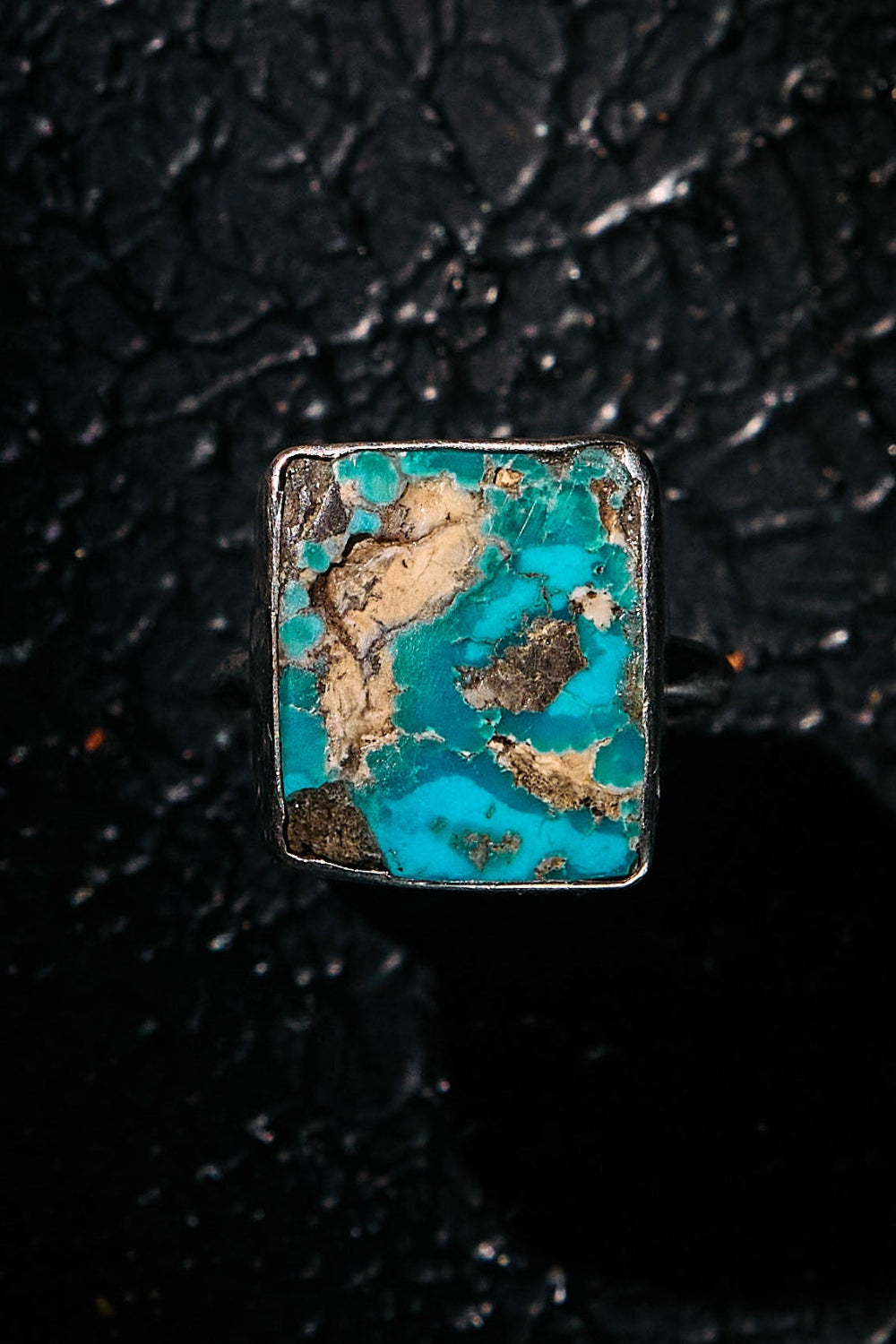 Turquoise stone ring with silver setting 