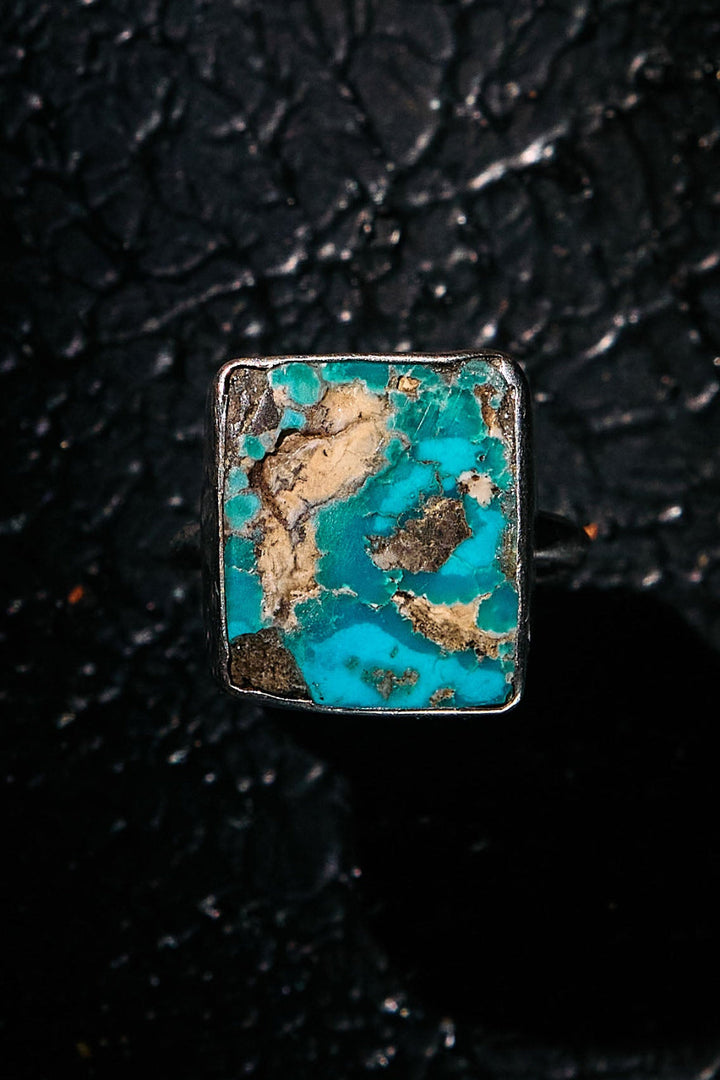 Turquoise stone ring with silver setting 