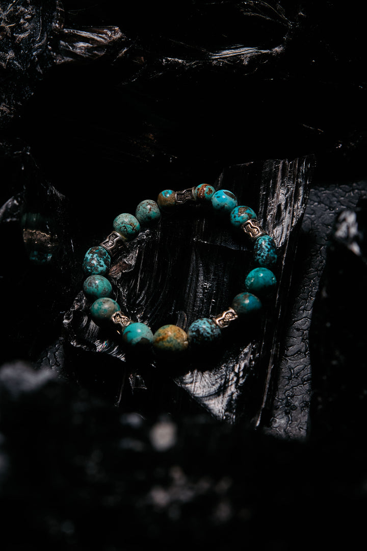 Turquoise beaded bracelet with sterling silver spacers 