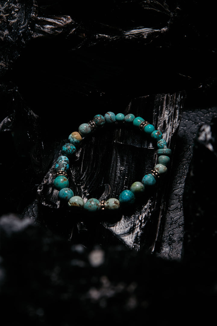 Turquoise beaded bracelet with silver spacers