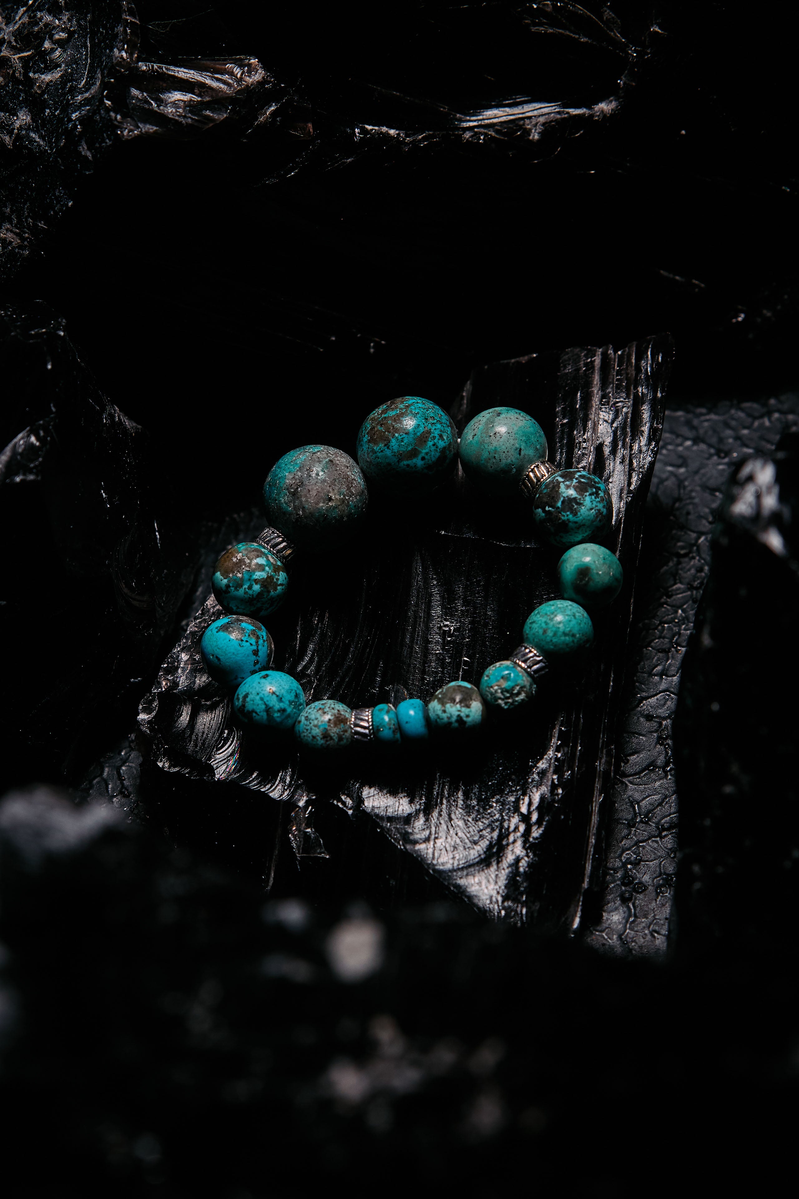Turquoise beaded bracelet on a dark background