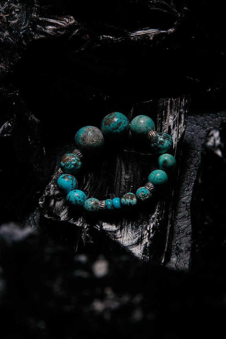 Turquoise beaded bracelet on a dark background