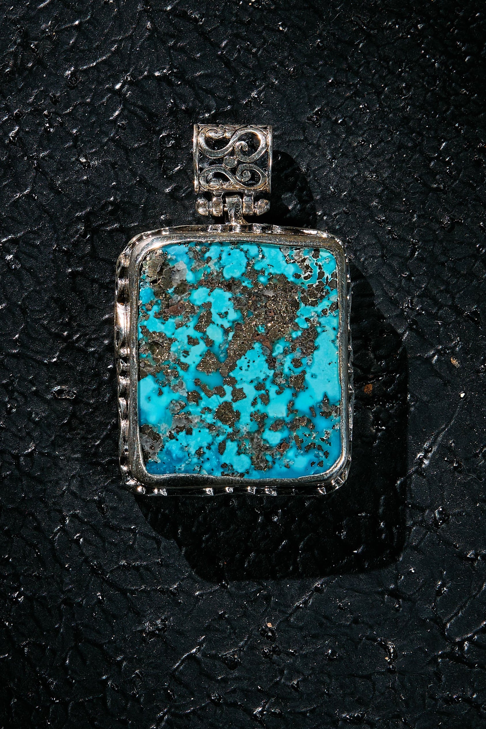 Rare Persian Turquoise stone pendant with heavy pyrite/silver inside