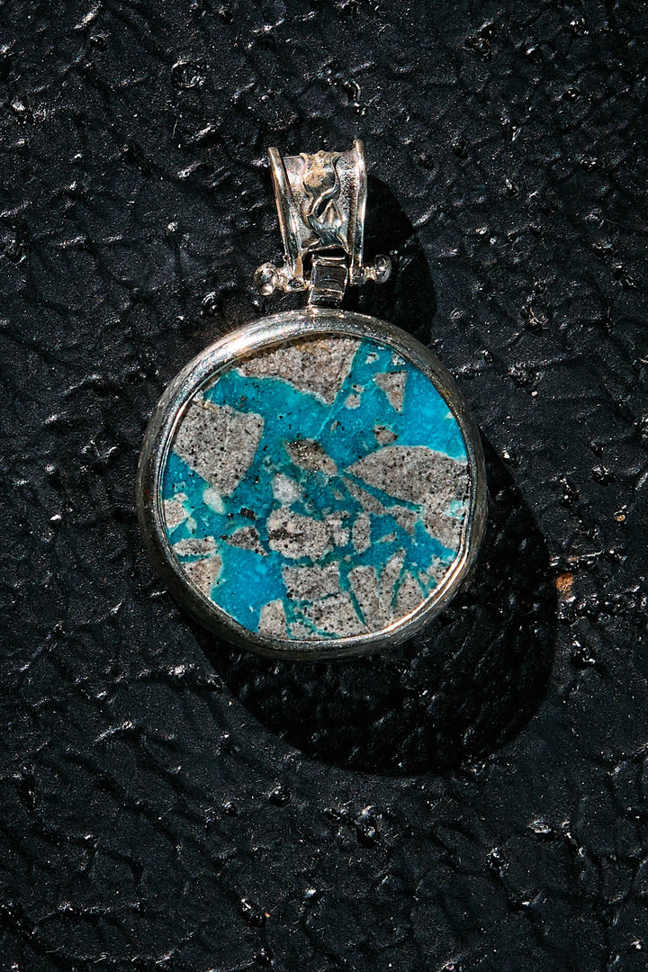 Pendant with blue and silver design in rare natural turquoise