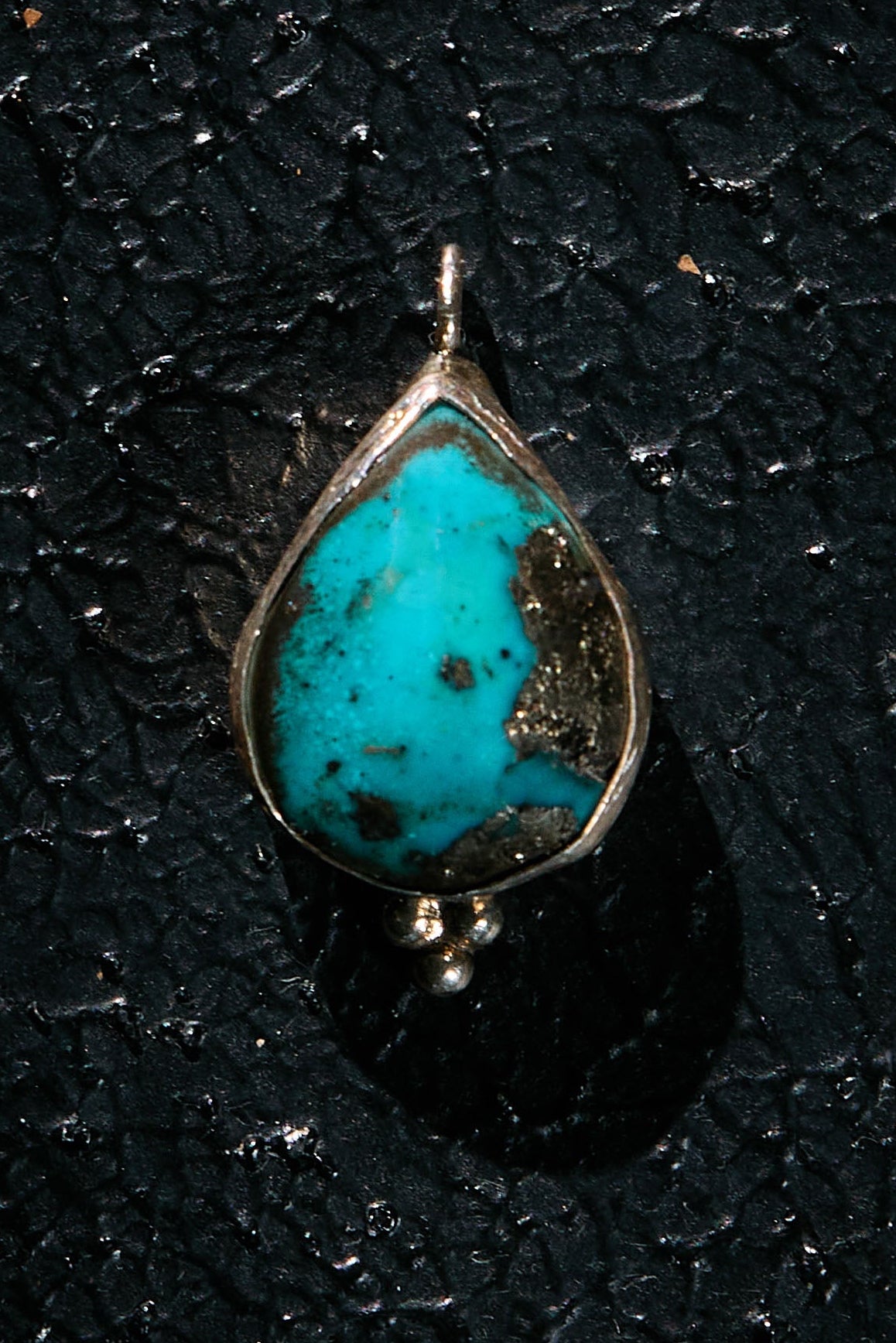 Teardrop-shaped natural Persian turquoise pendant in 925 silver