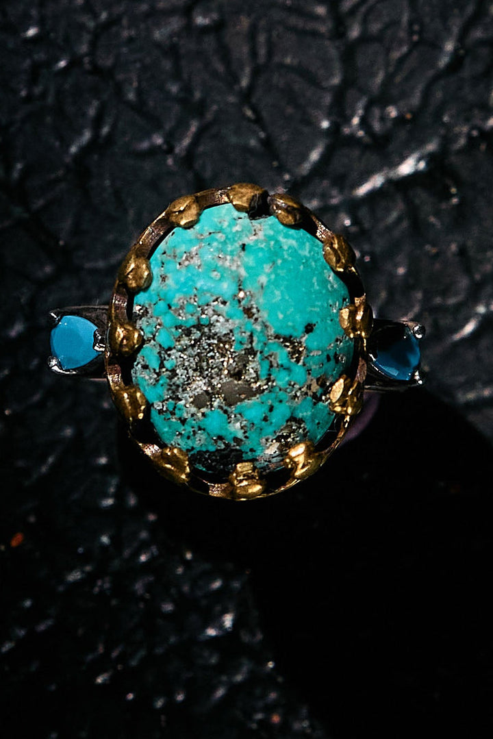 Turquoise ring on 925 silver with gold accents