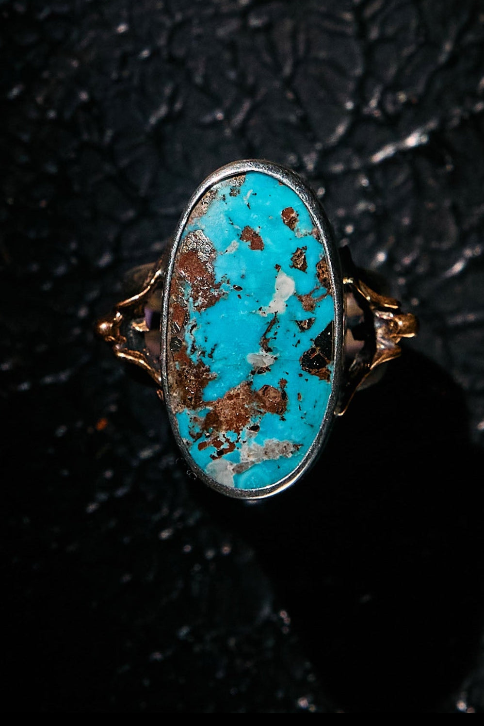 Turquoise ring with gold accents on 925 silver