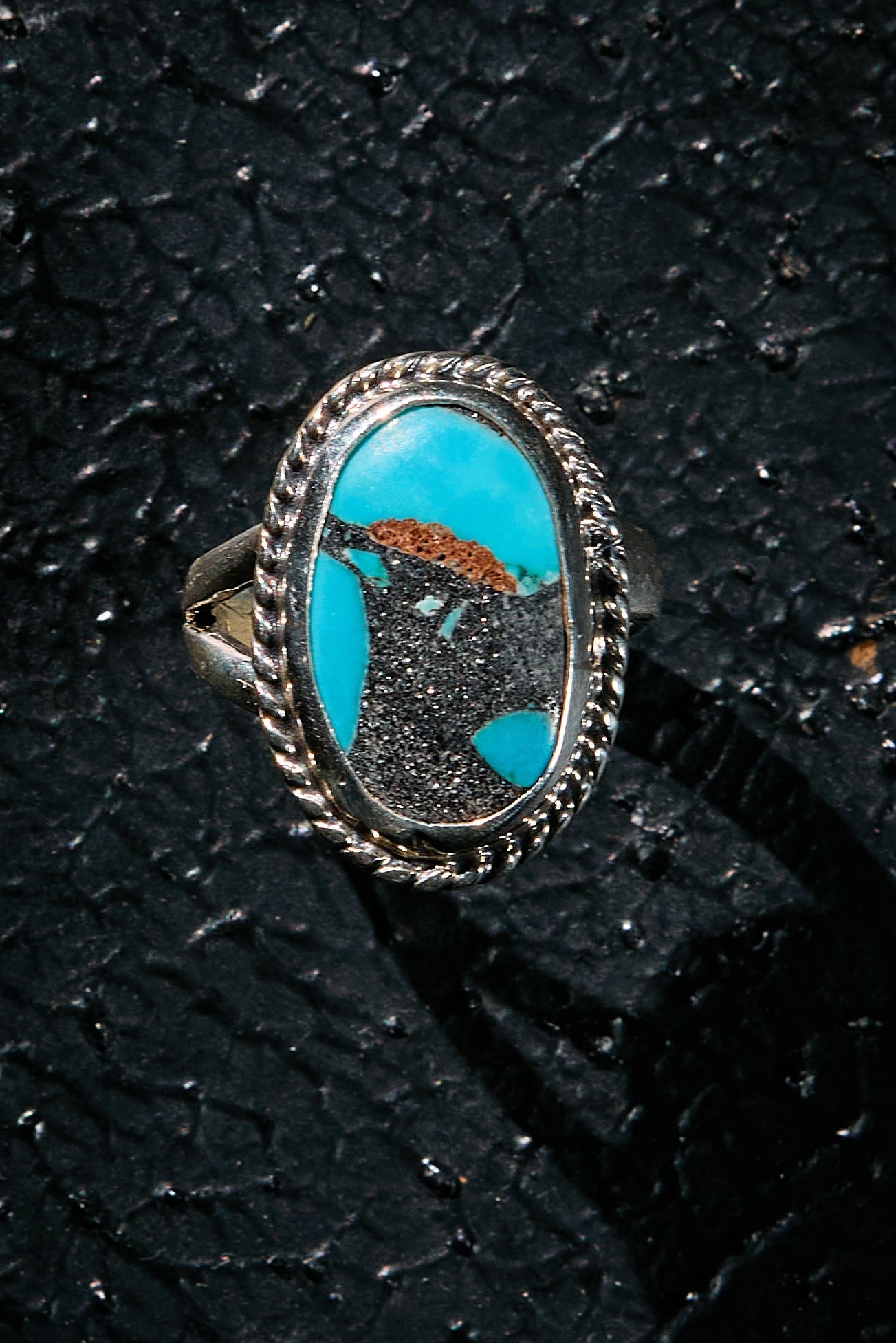Ring with rare Persian turquoise stone with a mythical shiny bird in the matrix