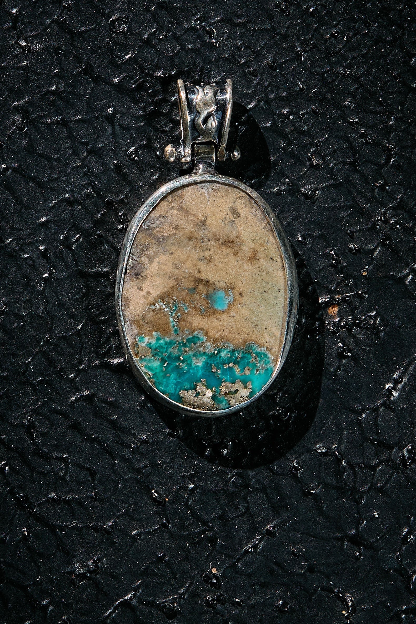 Rare Turquoise stone pendant on a 925 backing
