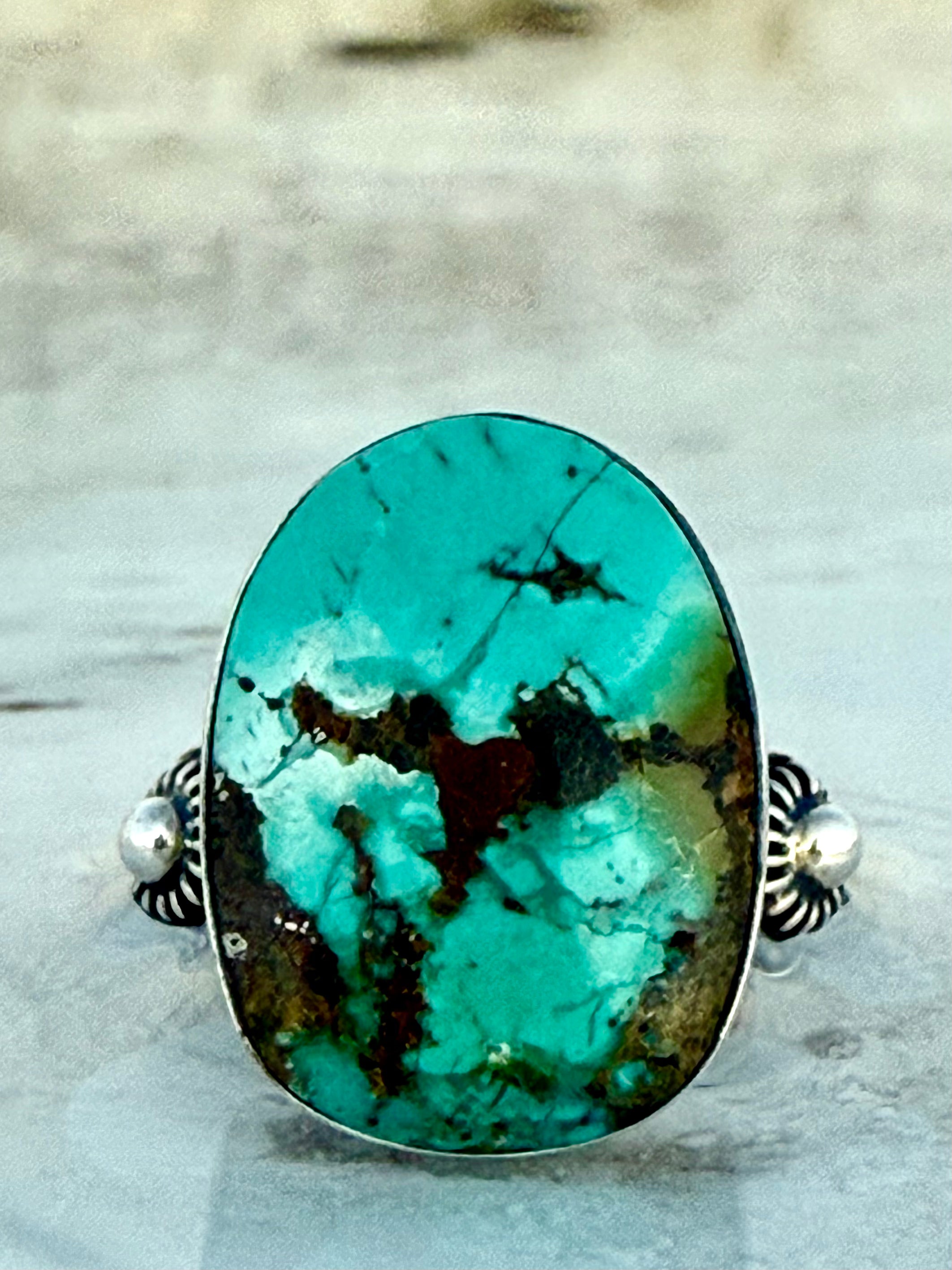 Museum level rare turquoise ring with silver band 