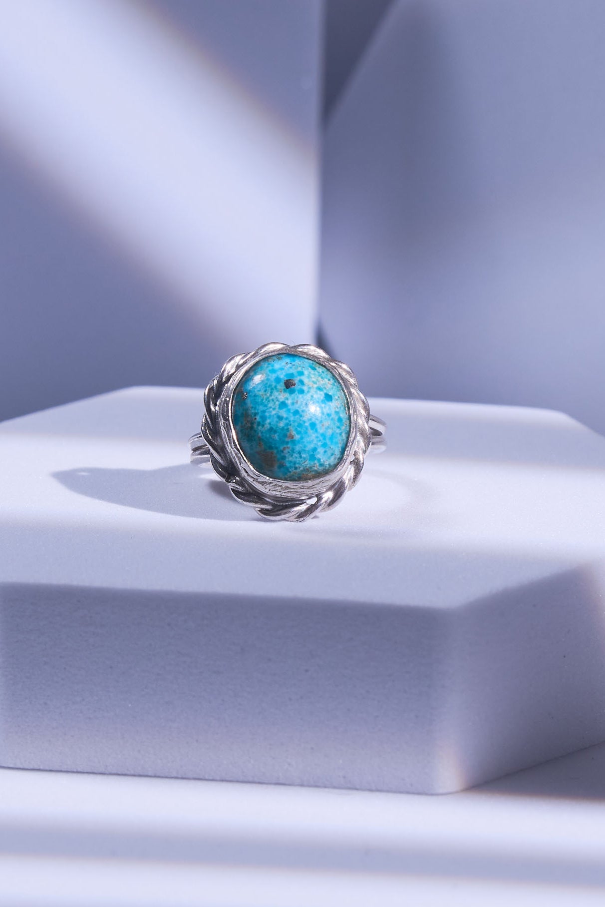 Turquoise ring with silver band 
with very rare white webbing matrix.