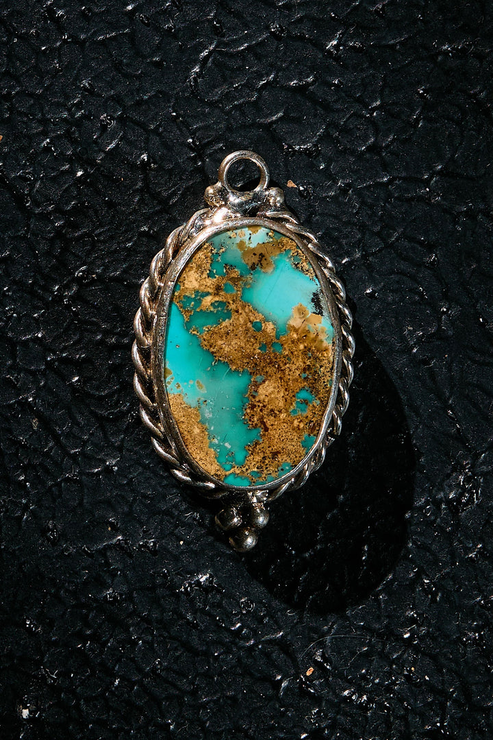 Rare turquoise stone with rocking horse spirit in matrix handcrafted in 925 