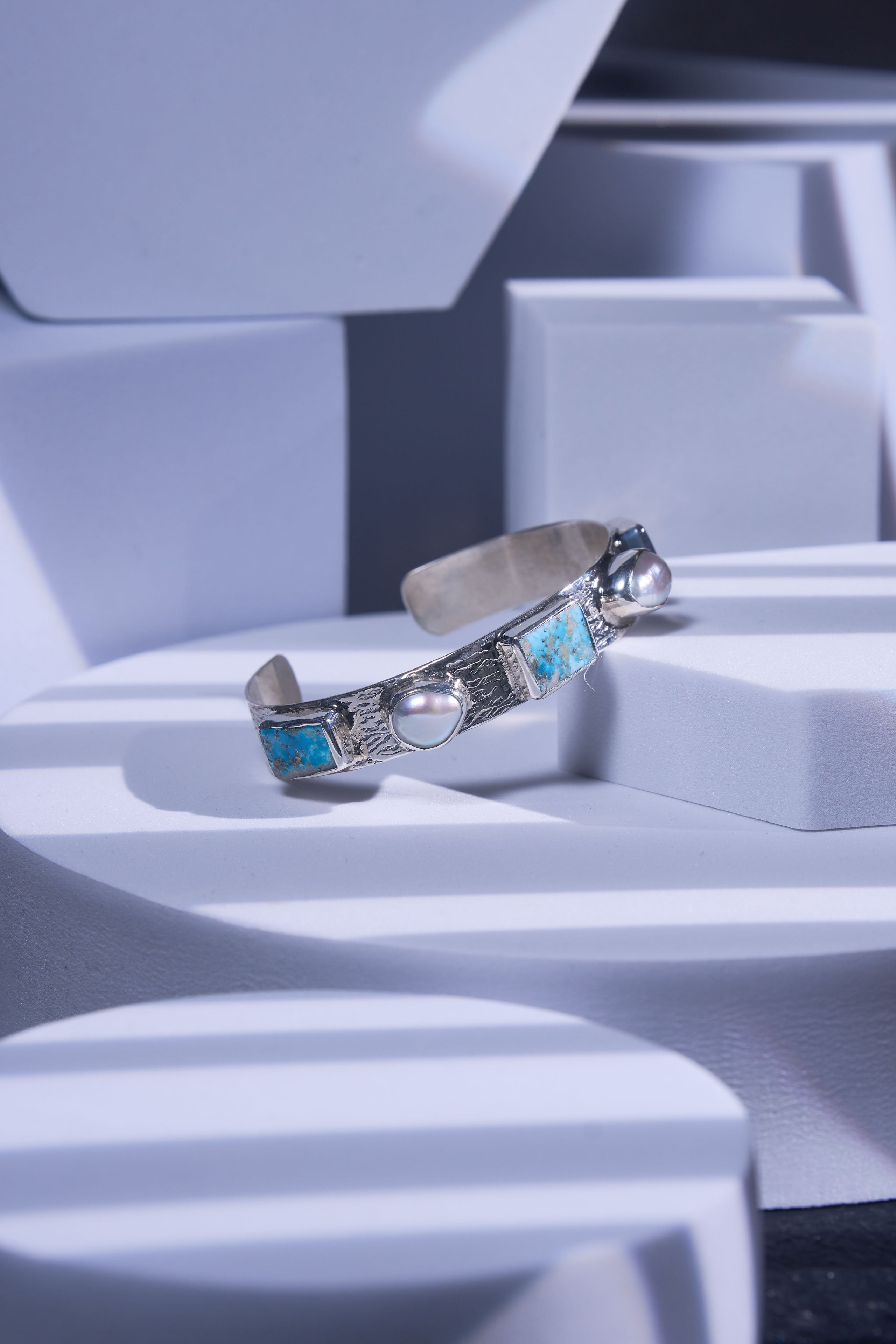 Silver bracelet with rare turquoise stones and pearls 
