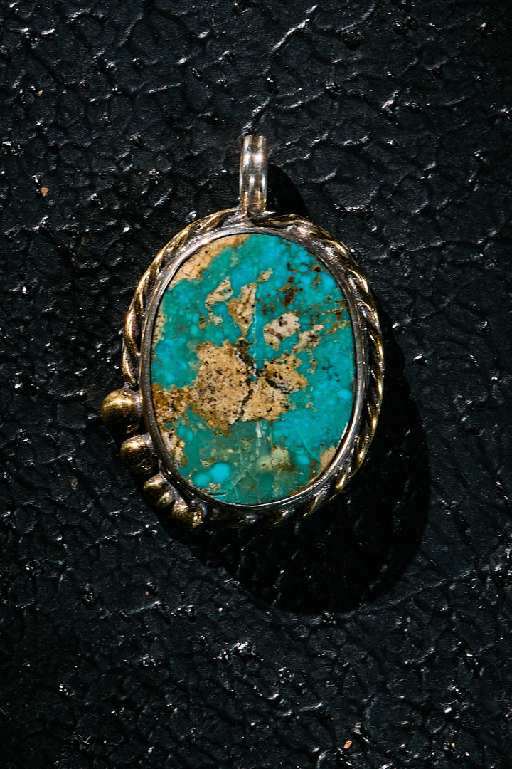 Natural rare turquoise stone pendant handcrafted in 925